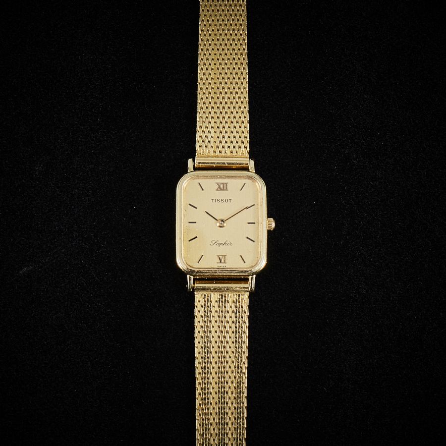 Armbandsur 18k guld Damur Tissot quartz. Diameter 20mm